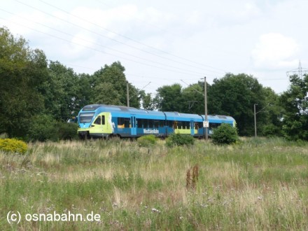 Westfalenbahn 39624 am 26.07.2009 Die WFB 39624 von Bielefeld nach Bad Bentheim zwischen Wissingen und Lüstringen. Das Foto entstand am 26.07.2009.